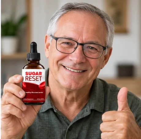 A customer wearing glasses giving a thumbs up with Sugar Reset